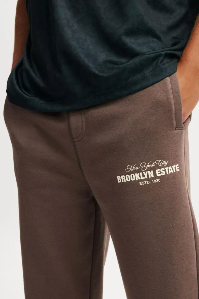 Cotton On Sweats and Hoodies Graphic Baggy Cuffed Track Pant Washed Chocolatebrooklyn Estate 8211 Men Cotton On Sweats and Hoodies Graphic Baggy Cuffed Track Pant Washed Chocolatebrooklyn Estate 8211 Men