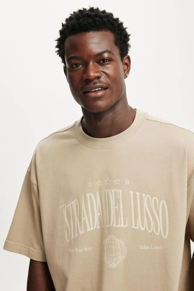 Cotton On Tees and Tanks Box Fit Graphic TShirt Gravel Stonestrada Del Lusso 8211 Men Cotton On Tees and Tanks Box Fit Graphic TShirt Gravel Stonestrada Del Lusso 8211 Men