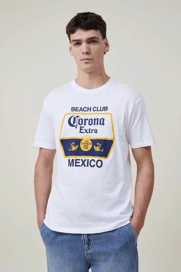 Cotton On Tees and Tanks Corona Premium Loose Fit TShirt Lcn Cor Whitecorona 8211 Beach Club 8211 Men Cotton On Tees and Tanks Corona Premium Loose Fit TShirt Lcn Cor Whitecorona 8211 Beach Club 8211 Men